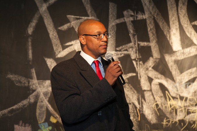 Adisa Banjoko speaking during the Living Like Kings opening reception